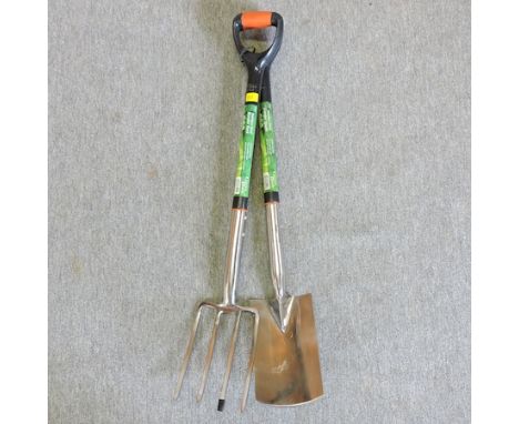 A stainless steel border fork and spade