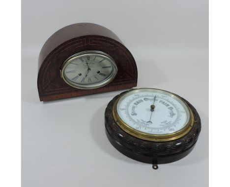 An early 20th century La Pendastrava coin operated mantel clock, 24cm tall, together with an aneroid barometer