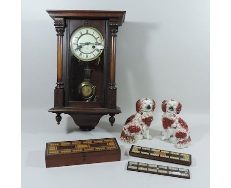 A Vienna style wall clock, 50cm tall, together with three cribbage boxes and a pair of Staffordshire spaniels
