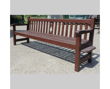A teak slatted wooden garden bench, 235cm