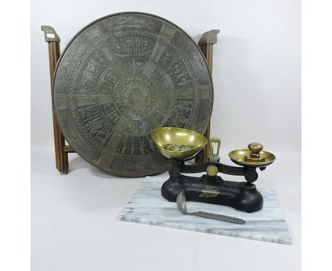 A set of brass and iron kitchen scales, together with marble board and an Indian brass top folding table