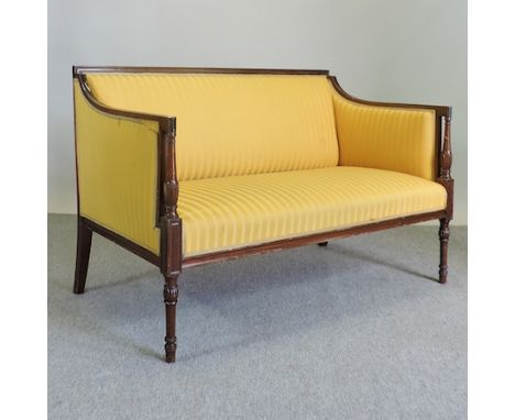 A Regency style walnut and yellow upholstered sofa, 128cm