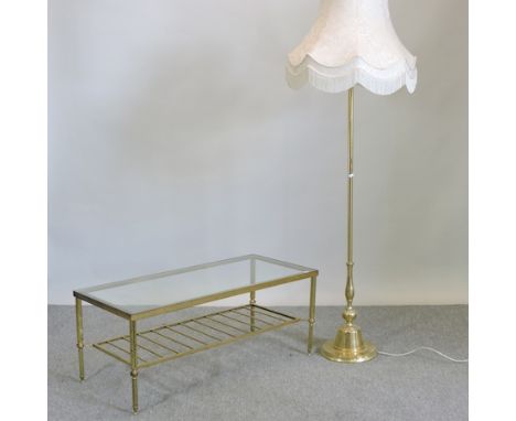 A brass two tier coffee table, with a glass top, 101cm, together with a brass standard lamp