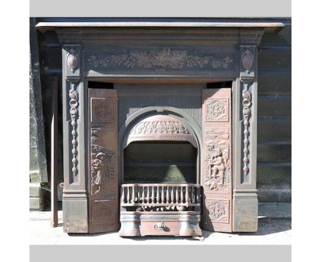 An early 20th century cast iron fire surround and grate, 128cm