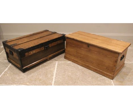 A Victorian pine chest, of tapering form, applied with iron swing handles to the sides, upon a moulded plinth base, 40cm H x 