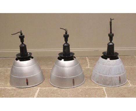 Three Simplex aluminum industrial light shades, mid 20th century, of typical domed form, below a painted iron pendant fitting
