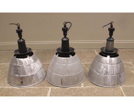 Three Simplex aluminum industrial light shades, mid 20th century, of typical domed form, below a painted iron pendant fitting