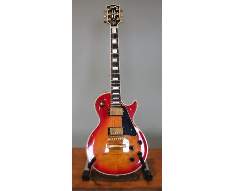 A 1997 Gibson Les Paul custom electric guitar, Made in USA, serial number 91047954, finished in cherry sunburst, 105th Day Na