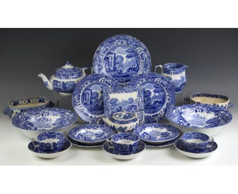 A Spode blue and white part tea service in the 'Italian' pattern, comprising: a teapot, cover and stand, eleven teacups, twel