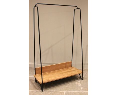 Rob Scarlett for Heals, a contemporary light oak tubular hanging rail, the powder coated frame united by a solid oak shelf, 1