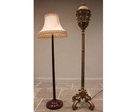 A giltwood standard lamp/lantern, early 20th century, the lantern of hexagonal form with a domed cover over six glazed panels