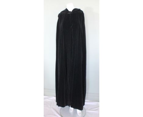 A Biba black velvet hooded cloak, maxi length, with satin lining, 'Biba' maker's label to interior, multisize 