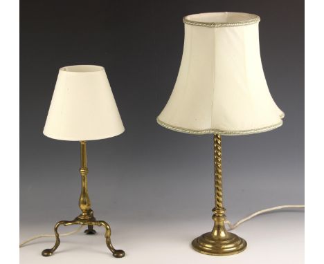 An Arts & Crafts brass desk lamp in the manner of W. A. S. Benson, raised on three short cabriole legs, 34cm high excluding s