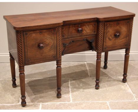 An early 19th century Welsh mahogany sideboard, in the manner of David Morley, Carmarthen, of inverted breakfront form, the c