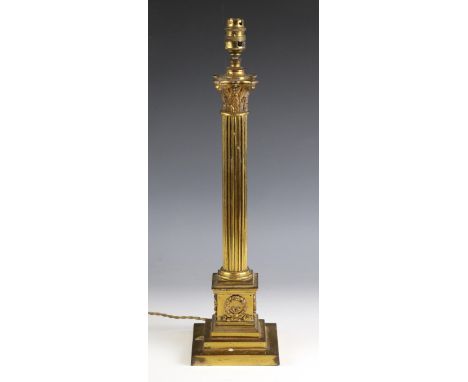 A Victorian lacquered brass Corinthian column table lamp by Hinks, raised on a stepped square plinth base, 52cm high (at faul