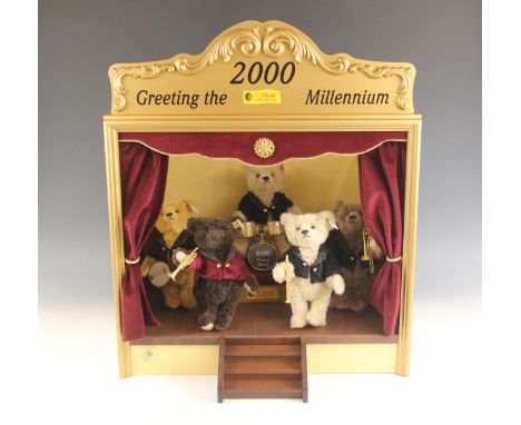 A limited edition Steiff 'Millennium Band', numbered 1044 of 2000, comprising five jazz playing bears on a stage with built i