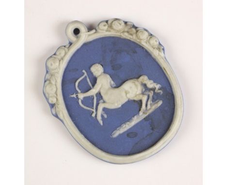 An Enoch Wood Jasper Ware plaque, late 18th century, of oval form with a central relief of a Satyr holding a bow and arrow, i