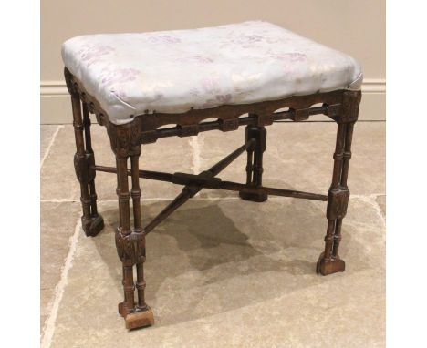 A Chinese Chippendale style mahogany dressing stool, early 19th century, the upholstered seat upon ring turned cluster column