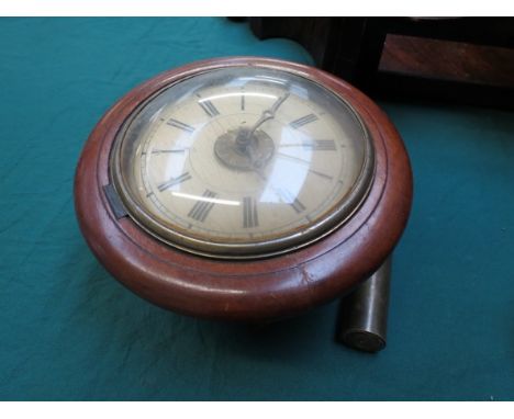 A Victorian postman's alarm clock with weight 