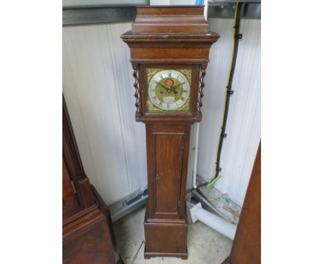 A late 18th/early 19th Century oak longcase clock of diminutive form with barley twist supports, Roman silvered chapter ring 