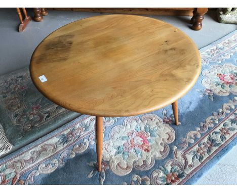 Ercol 'Golden Dawn' circular coffee table together with two Chinese rugs, table H47, W74cm, runner 243x67cm, rug 125x62.5cm