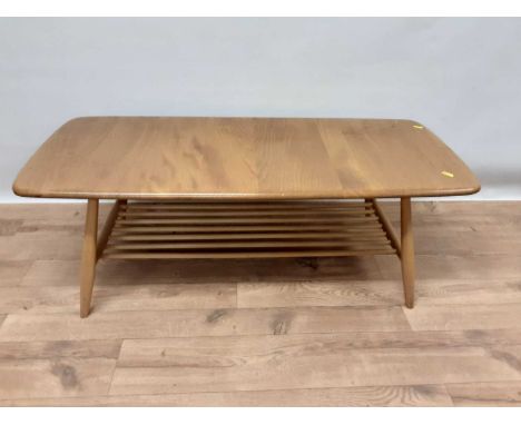 Ercol elm coffee table with magazine rack undertier, 104cm wide, 46cm deep, 36cm highCondition report: Table is in good used 