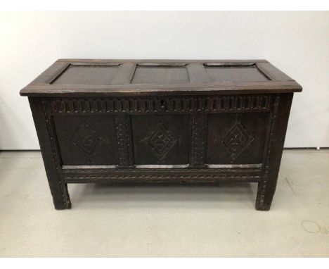17th century carved oak coffer with triple panel front, having three panel lid and arcade carved frieze over lozenge carved p