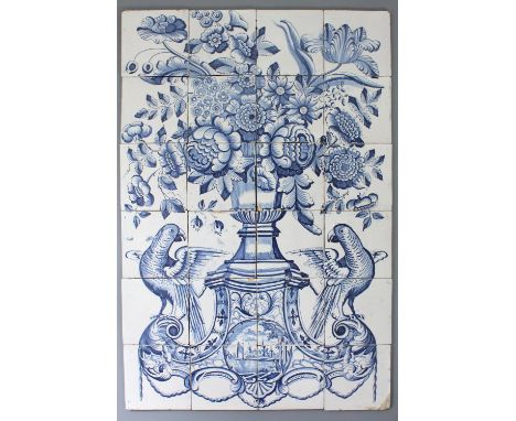 A large Dutch Delftware Frisian tile mural with a flower vase, 18th C. Ca. 78 x 39 cm. 3 tiles broken.