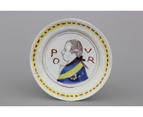 A Dutch Delft polychrome royal portrait plate, inscribed PVOR, ca. 1700 Dia: 16 cm