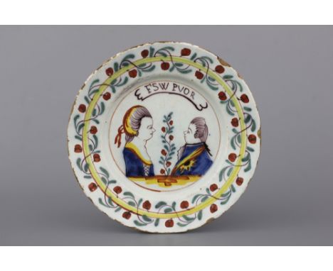 A Dutch Delft polychrome orangist royal portrait plate, 18th C. Dia: 22,5 cm