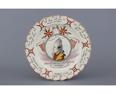 A Dutch-decorated English Leeds orangist creamware royal portrait dish 18th C. Dia.: 29 cm