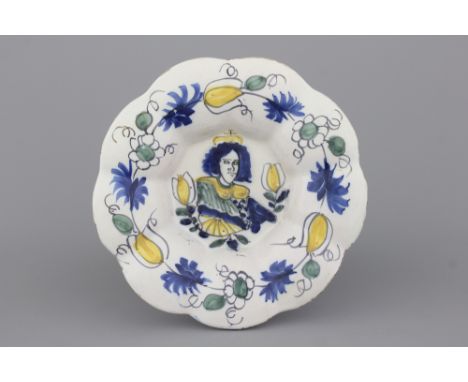 A Dutch Delft polychrome orangist royal portrait Queen Mary lobed plate, 18th C. Dia: 26 cm