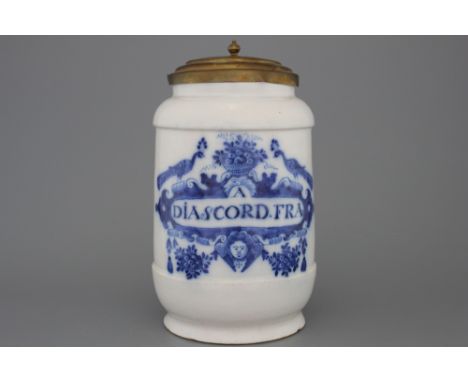A large Dutch Delft blue and white pharmacy jar and cover, albarello form, 18th C. Inscribed "A: Diascord Fra". Marked with a