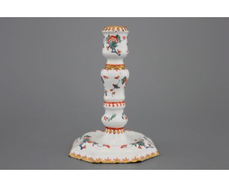 A Dutch Delft doré kakiemon style candlestick, 18th C. H: 13 cm (For a set of similarly executed pieces, see Sotheby's London