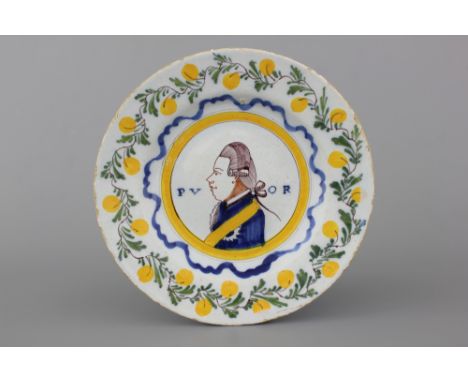 A Dutch Delft polychrome orangist royal portrait plate, 18th C. Dia.: 22 cm