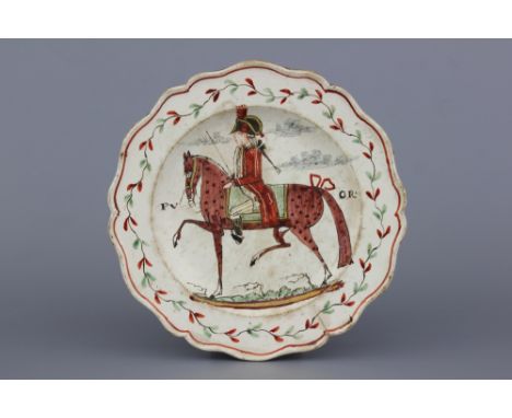 A Dutch-decorated English Leeds orangist creamware plate with a royal equestrian portrait, 18th C. Dia.: 18 cm