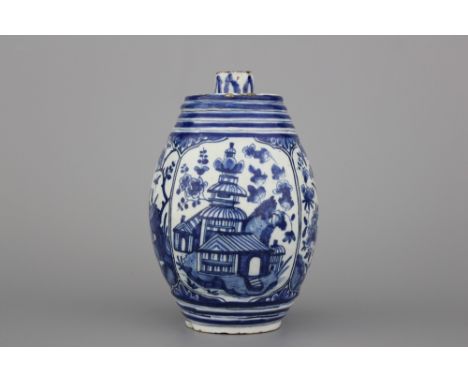 A rare Dutch Delft blue and white chinoiserie barrel-shaped spirit bottle, ca. 1720 H: 16 cm. Examples in Dutch Delftware are