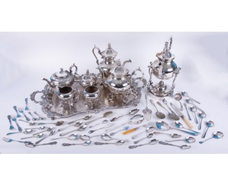 A silver plated tea service with tray including a spirit kettle together with fancy tea spoons, other spoons, berry spoons, e