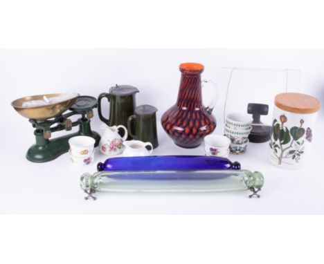 A mixed collection including kitchen scales, art glass vase, Victorian rolling pins, and reading stand.