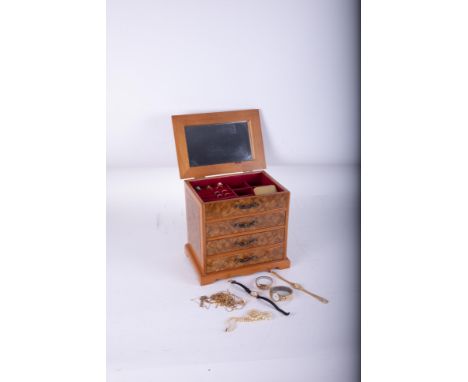 A modern walnut effect jewellery box containing some various jewellery and watches including a 9ct gold vintage Everite tank 