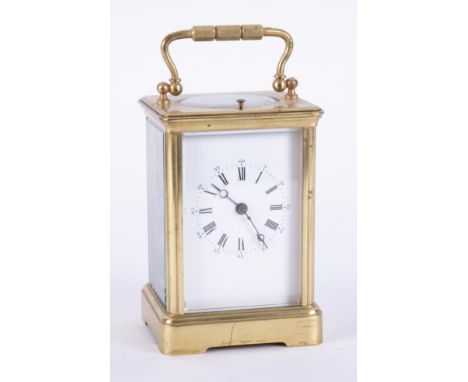 A French brass cased carriage clock, platform escapement, the white dial with Arabic and roman numerals, repeater movement, s
