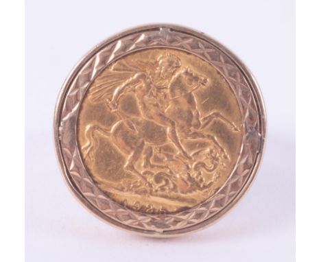 A 9ct yellow gold ring (not hallmarked or tested) set with a 1925 full sovereign, 15.89gm, approx. size Z+2.