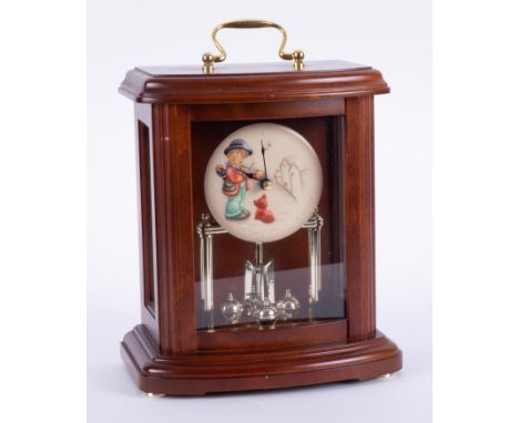 Hummel, an anniversary mantle clock in mahogany case, height 27cm.