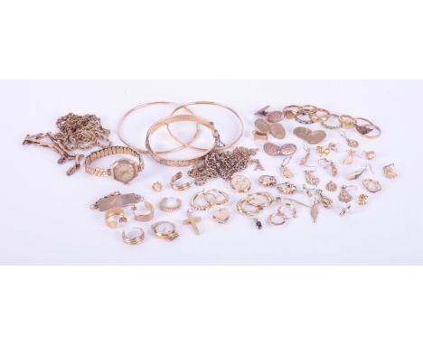 A mixed bag of 9ct yellow gold jewellery items including earrings, lockets, chain, pendants, bangles, rings, cufflinks, etc, 