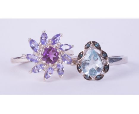 Two silver rings to include a silver Amethyst &amp; Tanzanite flower cluster ring and a silver ring set with a pear shaped aq