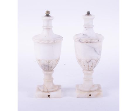 A pair of Alabaster lamp bases, height 26cm (damage to bases).