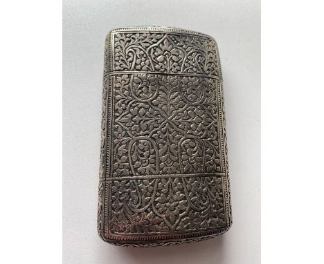 A Islamic cigar case with chased decoration 4 ¼ inches high 120 gms