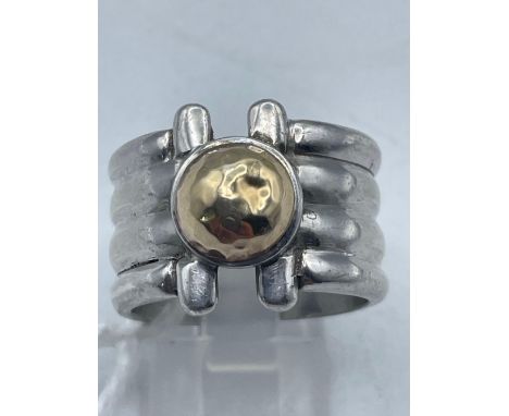A unusual four tier designer silver ring with gold ball decoration with hallmarks of 950 and 589 to interior