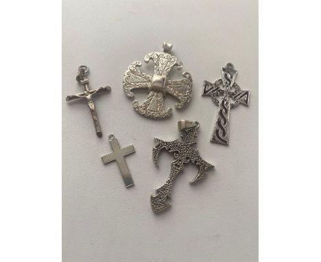 Five silver crosses including a Celtic example