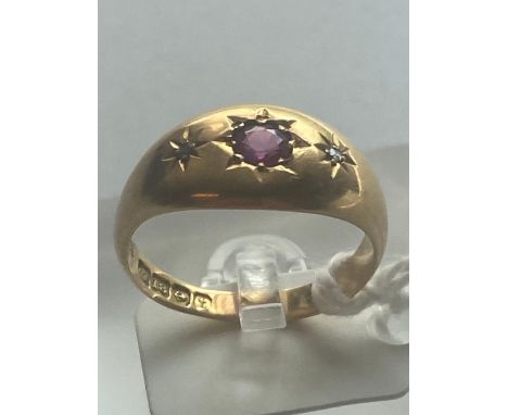 A ANTIQUE THREE STONE RUBY AND DIAMOND RING 18CT GOLD SIZE P 4.2 GMS